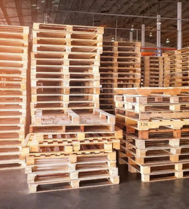 Stringer wooden pallets stacked and ready for delivery across Saudi Arabia KSA